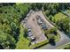 Aerial view of community boat storage area with numerous boats parked on trailers, surrounded by trees at 7053 Byrnes Ln., Myrtle Beach, SC 29588