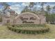 Stone community entrance sign for Cypress River Plantation with manicured landscaping at 7053 Byrnes Ln., Myrtle Beach, SC 29588