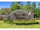 Beautiful brick sign with decorative flowers for Cypress River Plantation community at 7053 Byrnes Ln., Myrtle Beach, SC 29588