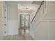 Elegant entryway with double doors and staircase at 7053 Byrnes Ln., Myrtle Beach, SC 29588