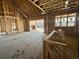 Framed living room featuring high ceilings, windows and an open floor plan at 7053 Byrnes Ln., Myrtle Beach, SC 29588