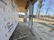 A covered patio with view of a lake is in progress during the new home build at 7053 Byrnes Ln., Myrtle Beach, SC 29588