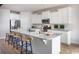 Modern kitchen with white cabinets and granite countertops at 719 Isle Verde Dr, Myrtle Beach, SC 29579