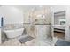 Luxurious bathroom with marble shower and freestanding tub at 744 Crystal Water Way, Myrtle Beach, SC 29579