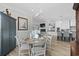 Elegant dining room with view of kitchen and living room at 744 Crystal Water Way, Myrtle Beach, SC 29579