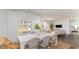 Spacious dining area with a farmhouse table and wicker chairs at 809 Green Garden Way, Myrtle Beach, SC 29579