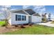 Gray and white sided home with a two car garage at 809 Green Garden Way, Myrtle Beach, SC 29579