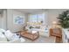 Cozy living room with white sofa and natural light at 809 Green Garden Way, Myrtle Beach, SC 29579