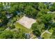 Aerial view of community amenities including a volleyball court and pond at 8560 Queensway Blvd. # 304, Myrtle Beach, SC 29572