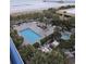 Aerial view of resort pool and hot tub with ocean view at 8560 Queensway Blvd. # 304, Myrtle Beach, SC 29572