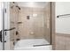 Bathroom with shower/tub combo and updated tile at 9237 Bellasara Circle, Myrtle Beach, SC 29579