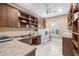 Laundry room with built-in cabinets and shelving at 9237 Bellasara Circle, Myrtle Beach, SC 29579