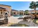 Relaxing poolside patio with fire pit and comfortable seating at 9237 Bellasara Circle, Myrtle Beach, SC 29579