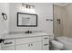 Modern bathroom with white vanity and tiled shower at 946 Crystal Water Way, Myrtle Beach, SC 29579