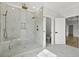 Large bathroom with walk-in shower and marble finishes at 946 Crystal Water Way, Myrtle Beach, SC 29579