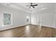 Bright bedroom featuring hardwood floors and ample natural light at 946 Crystal Water Way, Myrtle Beach, SC 29579