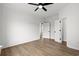 Bright bedroom with wood-look floors and ceiling fan at 946 Crystal Water Way, Myrtle Beach, SC 29579