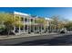 Brick townhouses with white columns and porches, located on a tree-lined street at 965 Hackler St. # C, Myrtle Beach, SC 29577