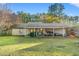 House exterior and backyard with covered patio at 1010 Shem Creek Circle, Myrtle Beach, SC 29588