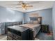 Bedroom with a queen-size bed, dresser, and ceiling fan at 1010 Shem Creek Circle, Myrtle Beach, SC 29588