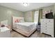 Bedroom with a queen-size bed and a large dresser at 1010 Shem Creek Circle, Myrtle Beach, SC 29588