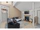 Living room with fireplace, high ceilings, and view into hallway at 1010 Shem Creek Circle, Myrtle Beach, SC 29588