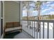 Private balcony overlooking a wooded area at 112 Cypress Point Ct. # 202, Myrtle Beach, SC 29579