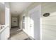 Condo entry with white door and access to a balcony at 112 Cypress Point Ct. # 202, Myrtle Beach, SC 29579