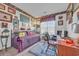 Home office with a daybed, desk, and wall of framed memorabilia at 116 Cobblestone Dr., Pawleys Island, SC 29585