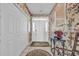 Bright entryway with floral wallpaper and tile flooring at 116 Cobblestone Dr., Pawleys Island, SC 29585