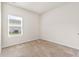 Well-lit bedroom with neutral walls and carpeted floor at 124 Marley Blue Dr., Little River, SC 29566