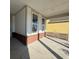 Covered patio showing brick foundation, concrete floor and view of yard at 1245 Crested Iris Way, North Myrtle Beach, SC 29582