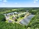 Aerial view of a house and neighborhood by the lake at 137 Alpharetta Ct., Conway, SC 29526