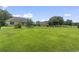 Large grassy backyard with a home and privacy fence at 137 Alpharetta Ct., Conway, SC 29526