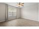 Bright bedroom featuring wood-look floors and a window with blinds at 137 Alpharetta Ct., Conway, SC 29526