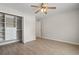 Spacious bedroom with wood-look floors and a large closet at 137 Alpharetta Ct., Conway, SC 29526