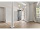 Elegant entryway with hardwood floors and a large column at 137 Alpharetta Ct., Conway, SC 29526