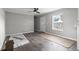 Spacious living room with gray walls and wood-look floors at 1533 Sand Dollar Ln., Garden City Beach, SC 29576