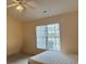 Bedroom with double bed and window with blinds at 201 Melody Gardens Dr., Surfside Beach, SC 29575