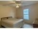 Bright bedroom with a double bed, window, and ceiling fan at 201 Melody Gardens Dr., Surfside Beach, SC 29575