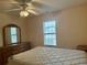 Bedroom with a double bed and ceiling fan at 201 Melody Gardens Dr., Surfside Beach, SC 29575