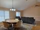 Dining area with table and chairs, near living room at 201 Melody Gardens Dr., Surfside Beach, SC 29575