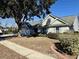 House exterior with lush green landscaping at 201 Melody Gardens Dr., Surfside Beach, SC 29575