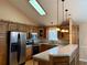 Kitchen with stainless steel appliances and an island at 201 Melody Gardens Dr., Surfside Beach, SC 29575