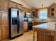 Stainless steel appliances and ample wood cabinetry at 201 Melody Gardens Dr., Surfside Beach, SC 29575