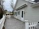 Private patio with stamped concrete and white fence at 201 Melody Gardens Dr., Surfside Beach, SC 29575