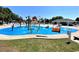 Community pool with splash pad and lounge chairs at 201 Melody Gardens Dr., Surfside Beach, SC 29575