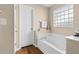 Bathroom with garden tub, neutral walls, and a window at 244 Mckendree Ln., Myrtle Beach, SC 29579