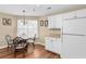 Kitchen features granite counters, white cabinets and breakfast table at 244 Mckendree Ln., Myrtle Beach, SC 29579