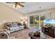 Comfortable living room with hardwood floors and view of patio at 244 Mckendree Ln., Myrtle Beach, SC 29579